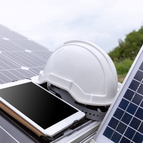 solar-photovoltaic-panels-station-checks-with-tablet-computer solar-photovoltaic-panels-station-checks-with-tablet-computer